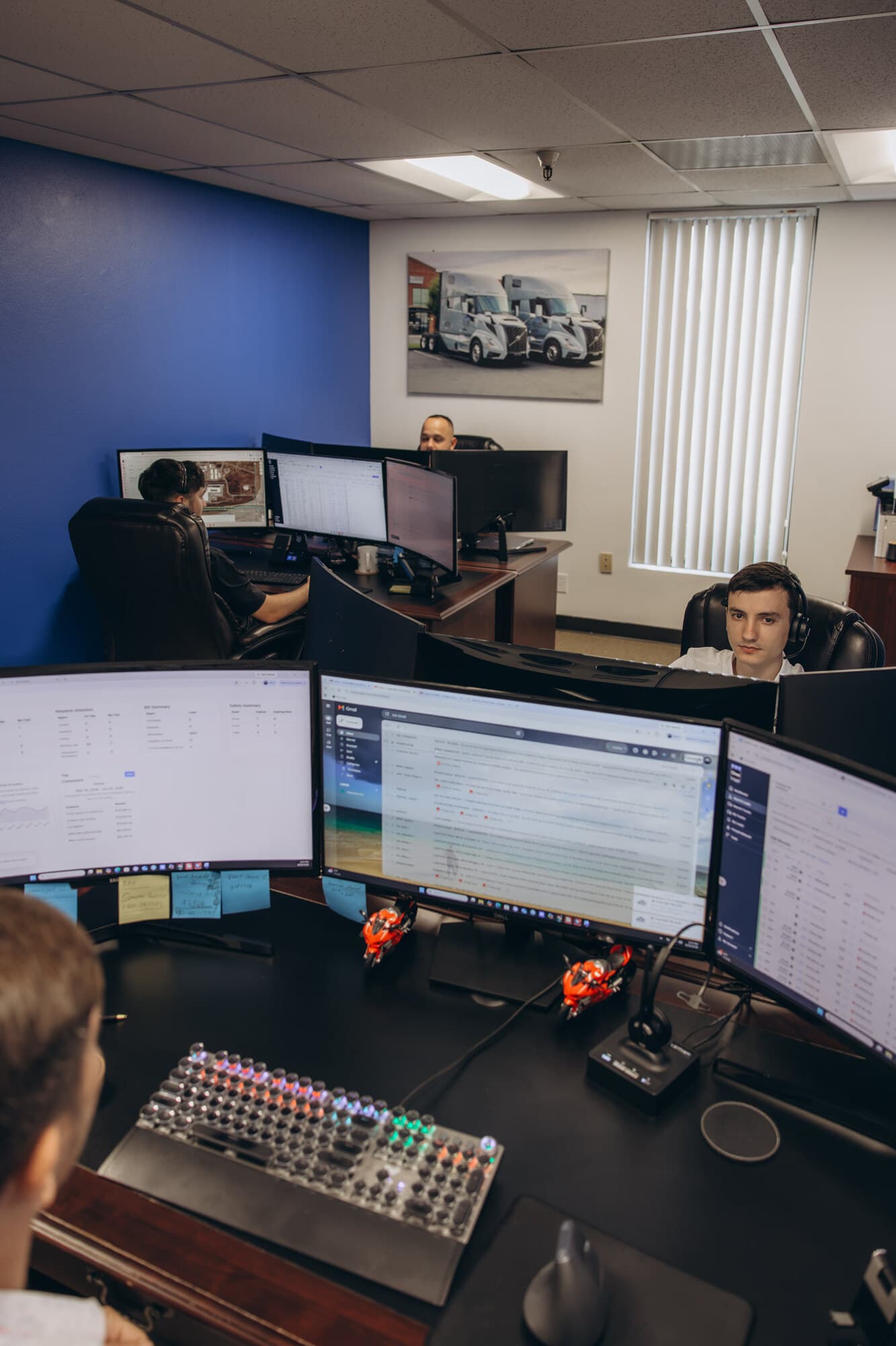 MVM Logistics dispatchers working at their monitors