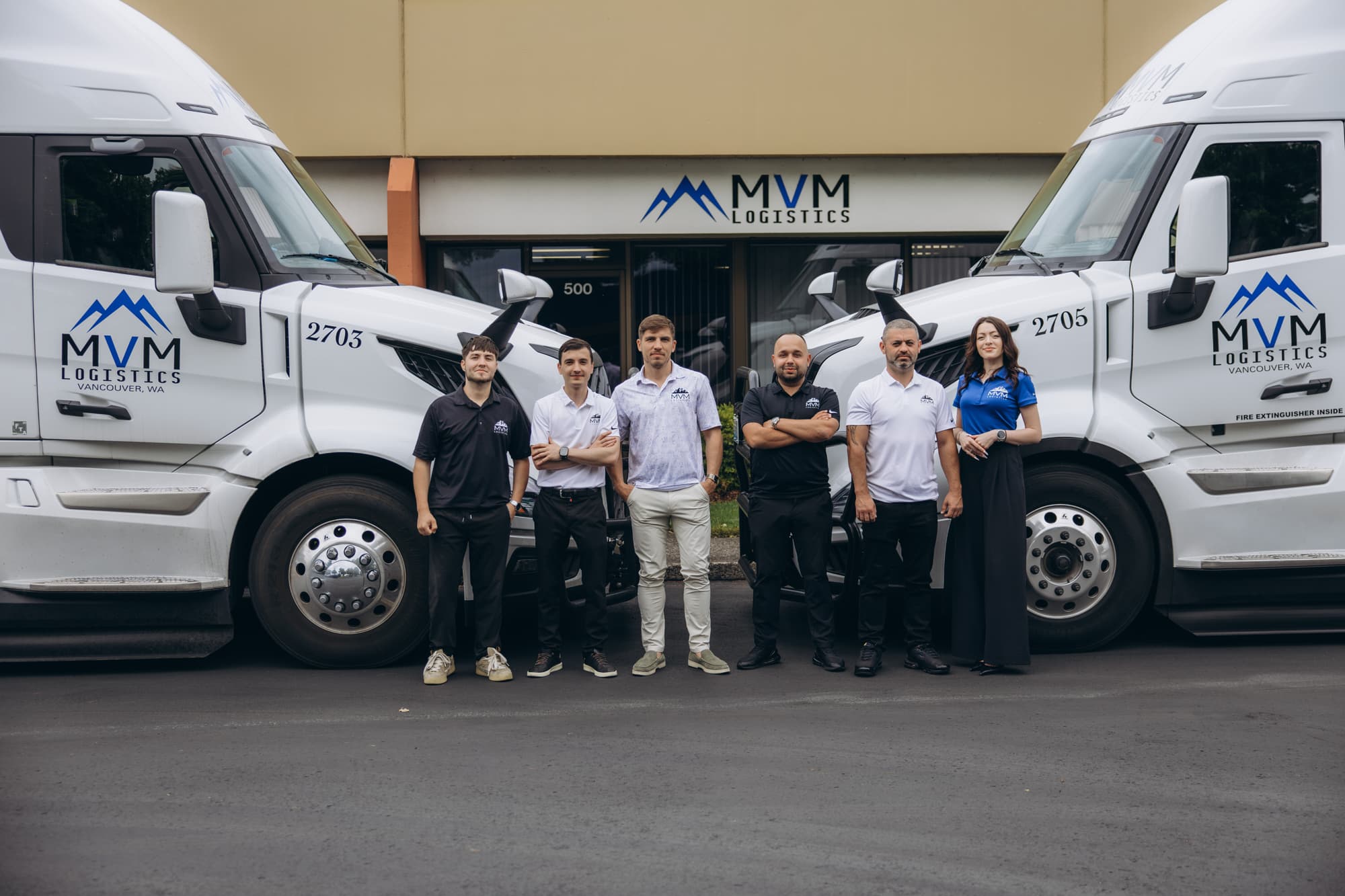 The MVM Logistics team in front of the fleet in Vancouver, WA